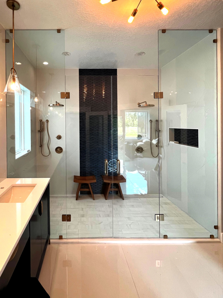 Double Door Entry Hung on Panels Floor to Ceiling